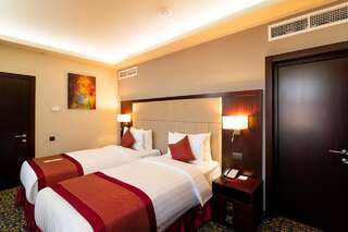Отель Ramada Hotel & Suites by Wyndham Yerevan Ереван Президентский люкс с 2 спальнями-3
